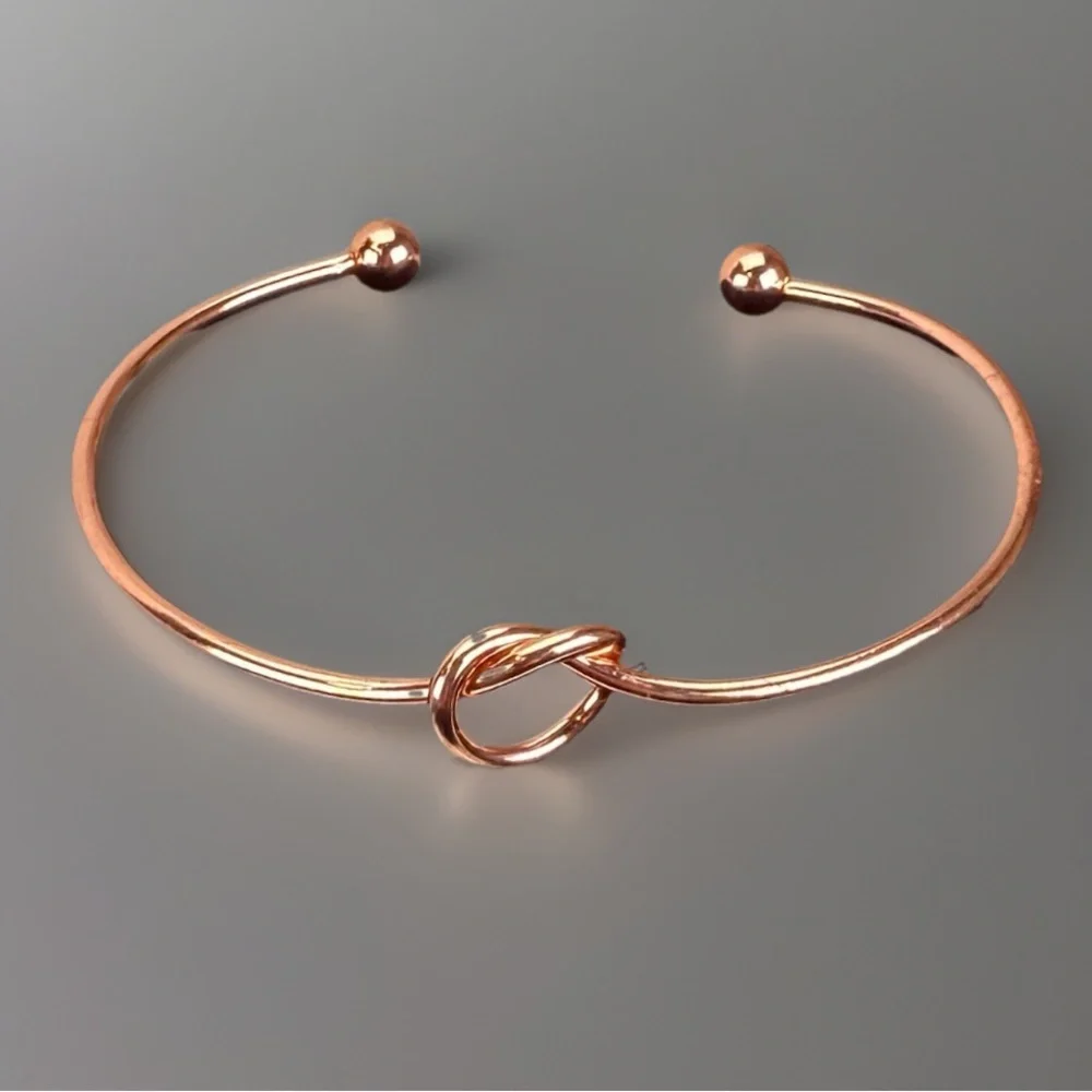 Pretty rose goldtone knotted minimalist cuff bracelet